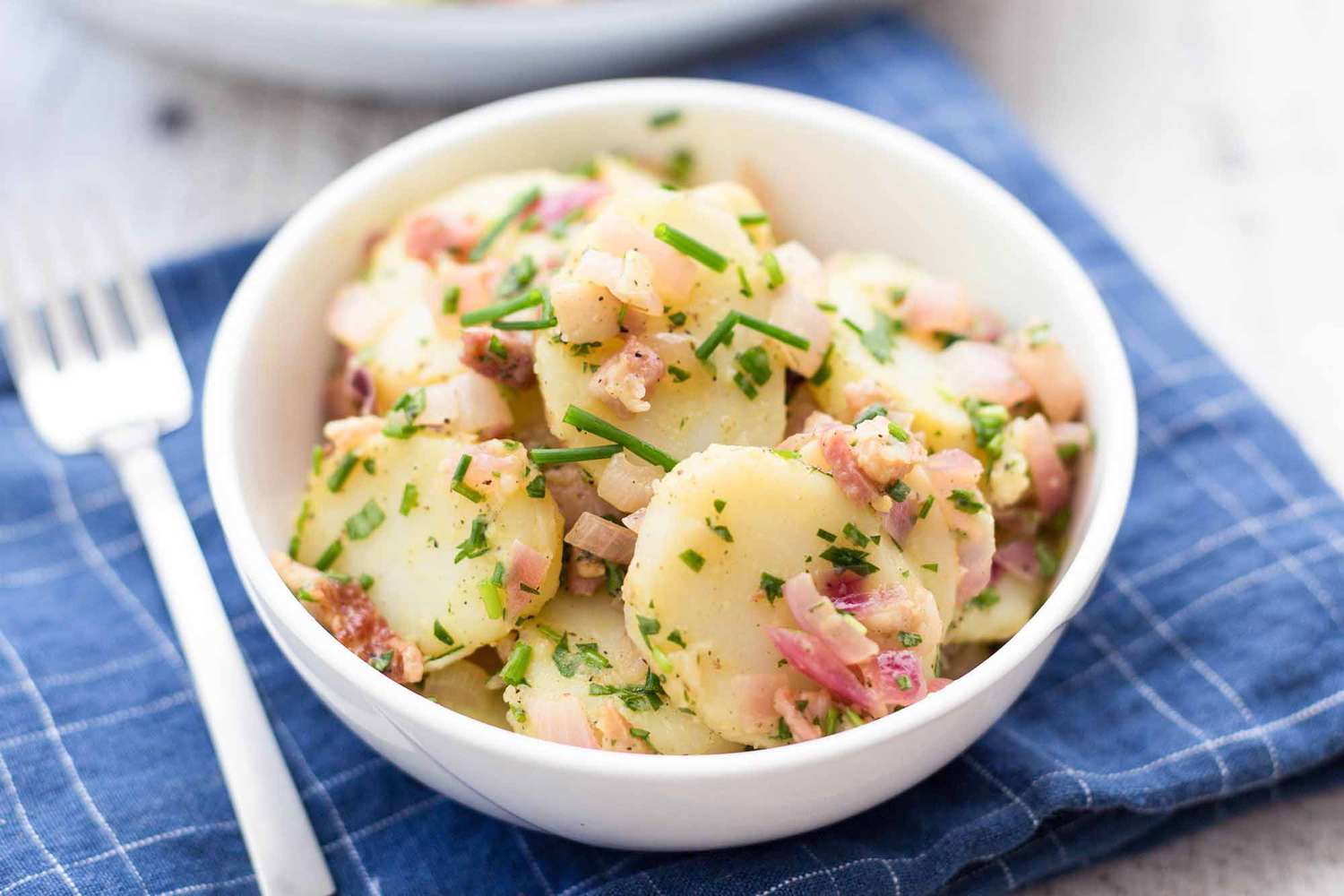 A bowl of German potato salad ready to eat