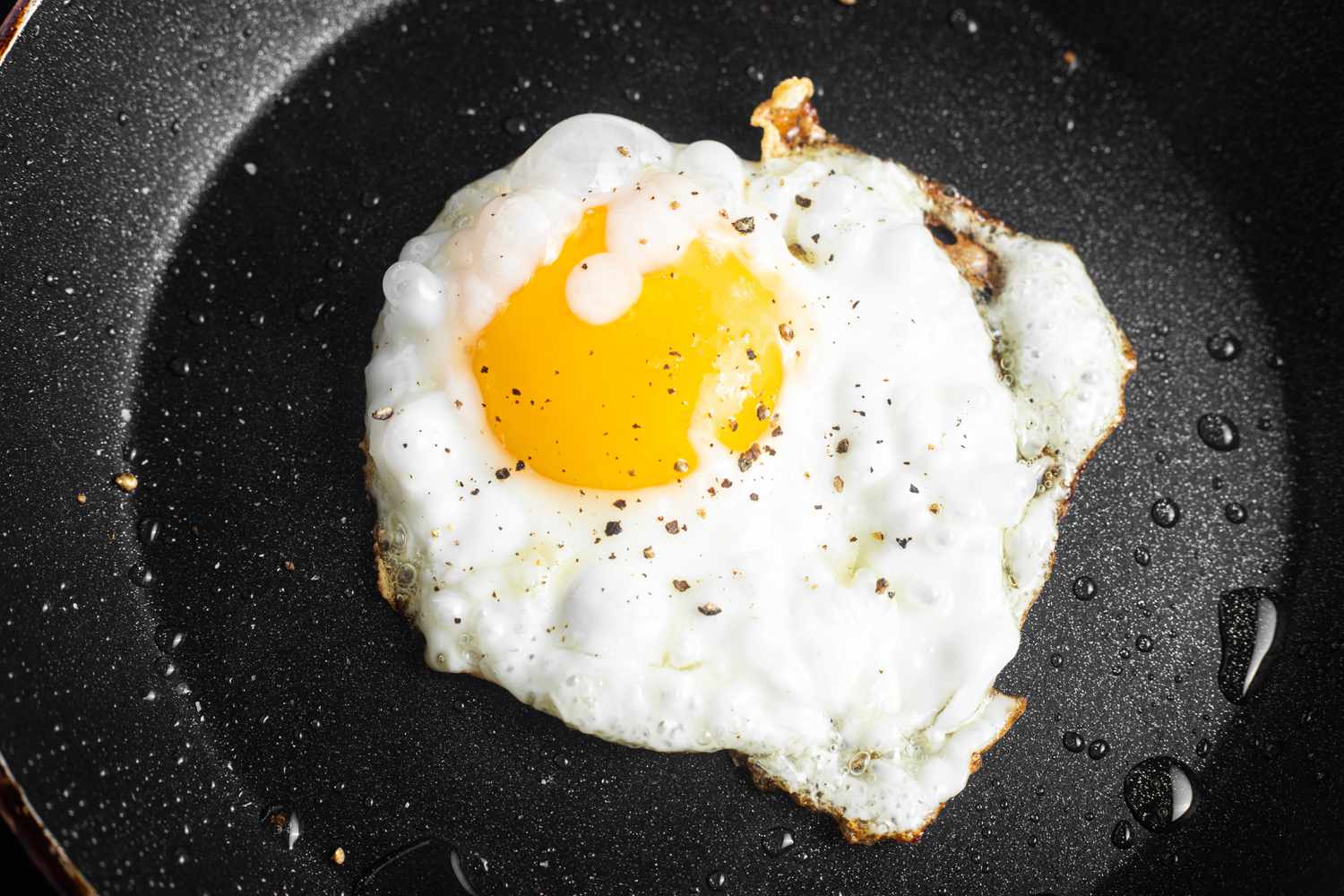 Fried Egg on Pan for Farro and Mushroom Grain Bowls