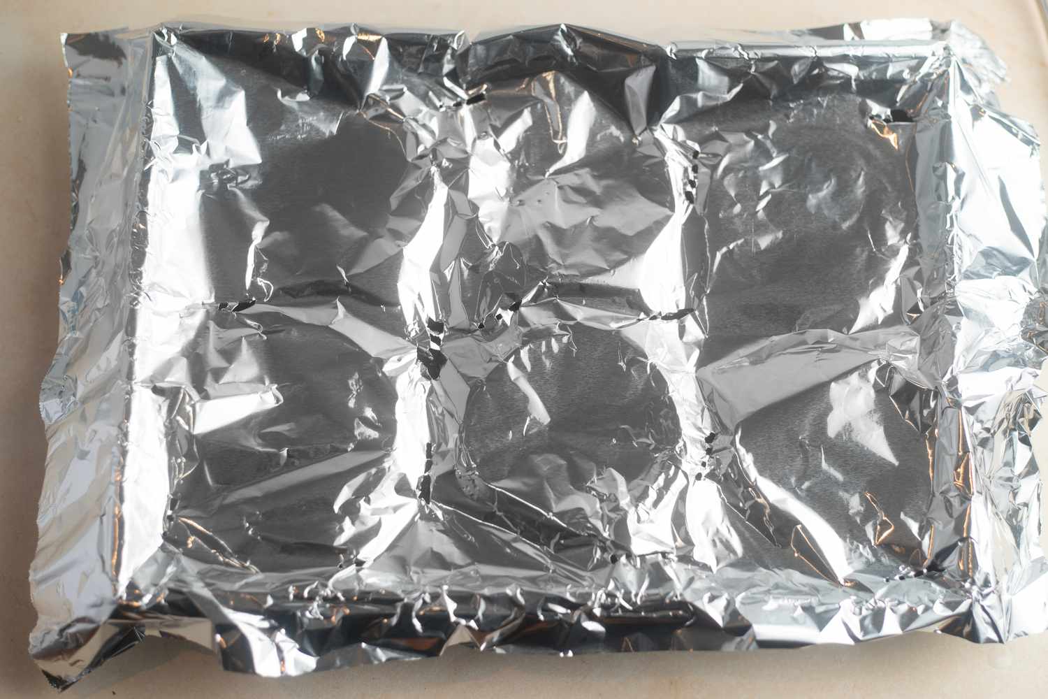 Chocolate Pots de Crème Tray Covered with Aluminum Foil