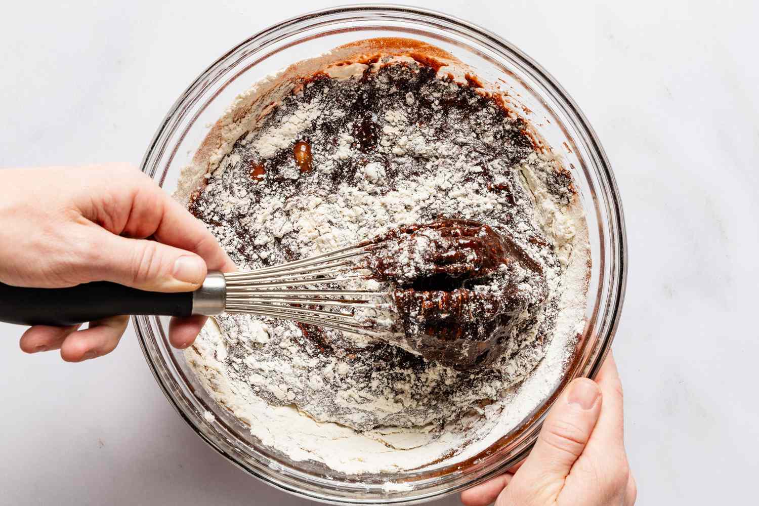 dry and wet ingredients whisked together for devil's food cake recipe