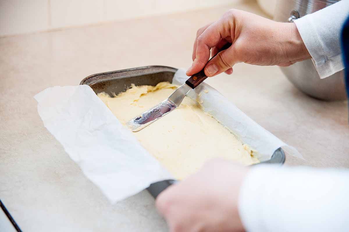 Iced Lemon Pound Cake - smoothing batter in pan