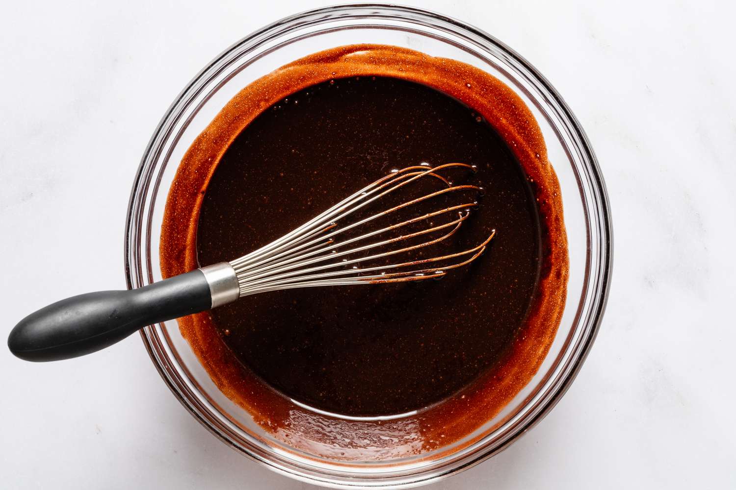 wet ingredients whisked together for devil's food cake recipe