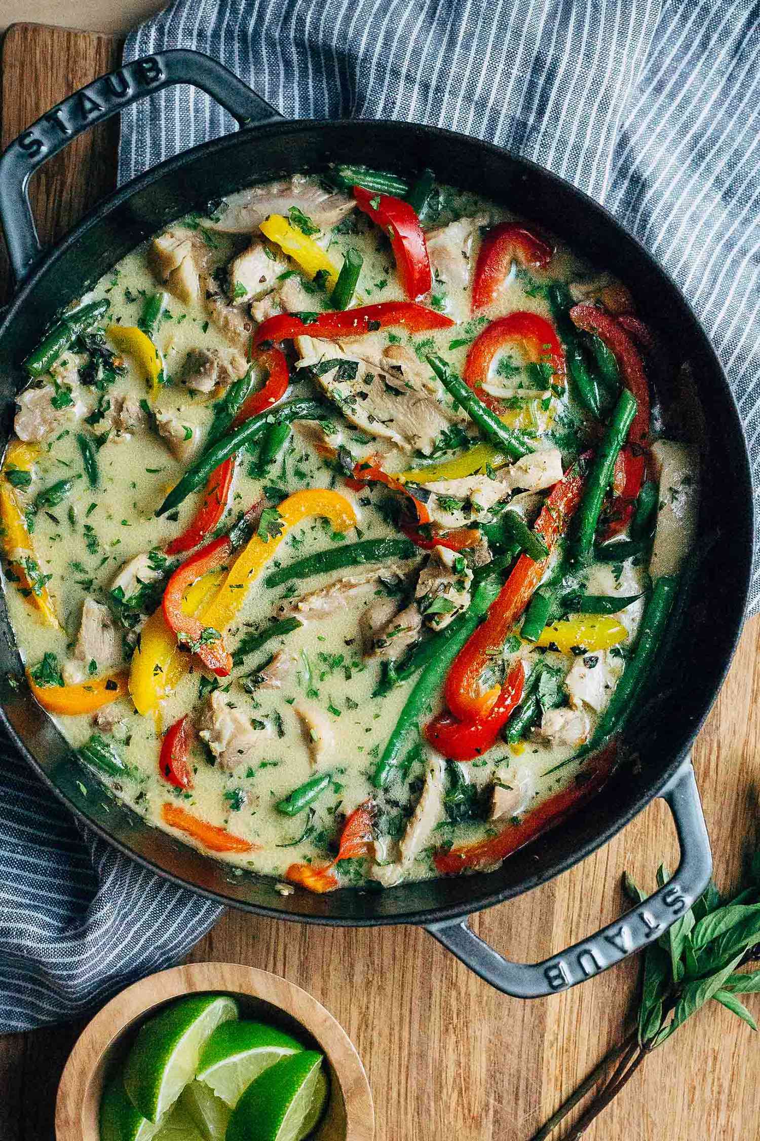 Thai green curry in a cast iron skillet ready to serve