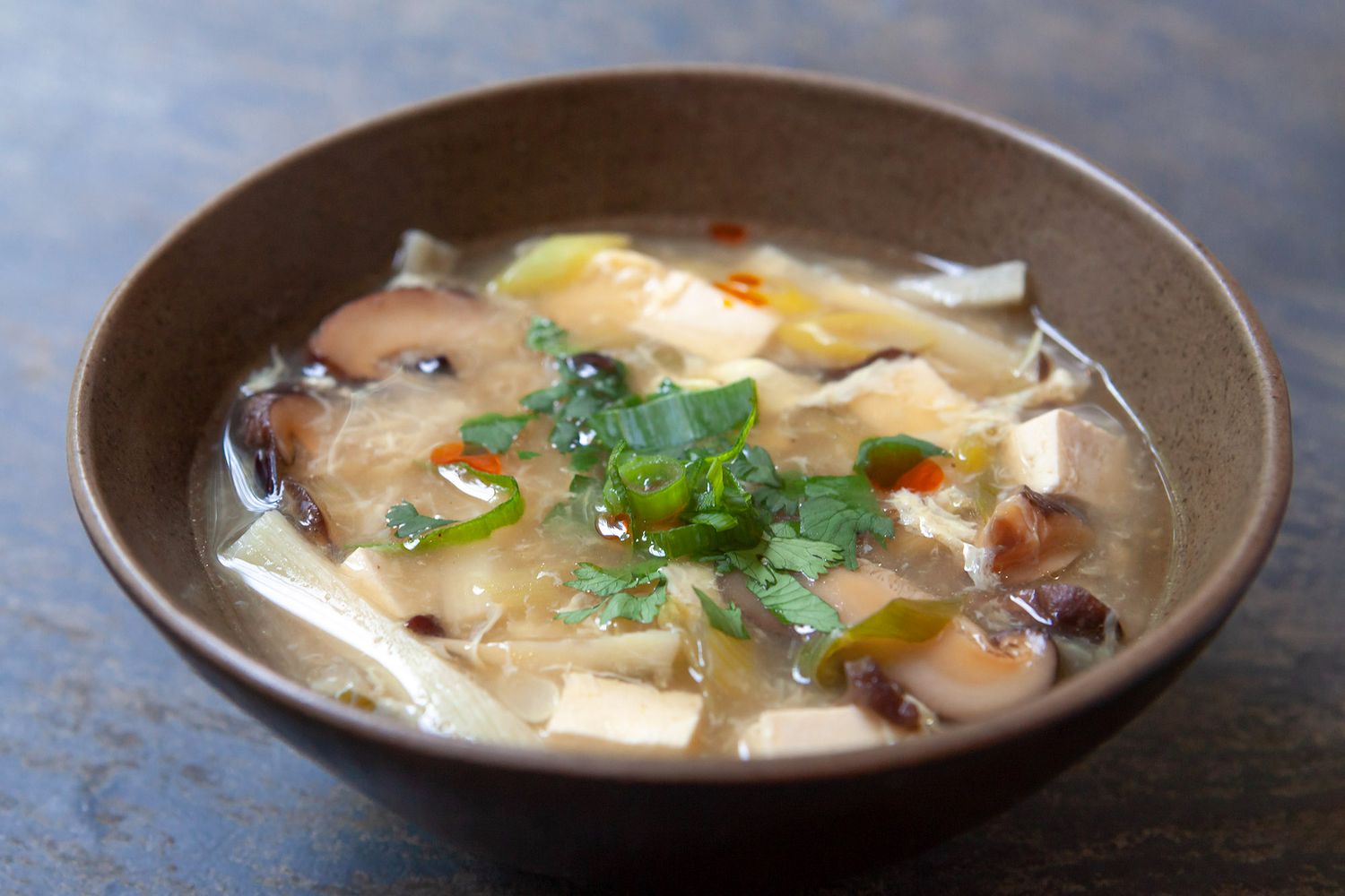 Sweet and sour soup in a bowl.