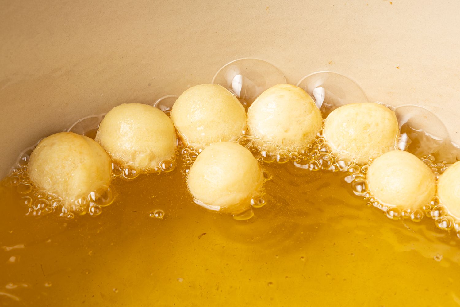 Donut Holes Frying in the Oil for How to Make Donuts 