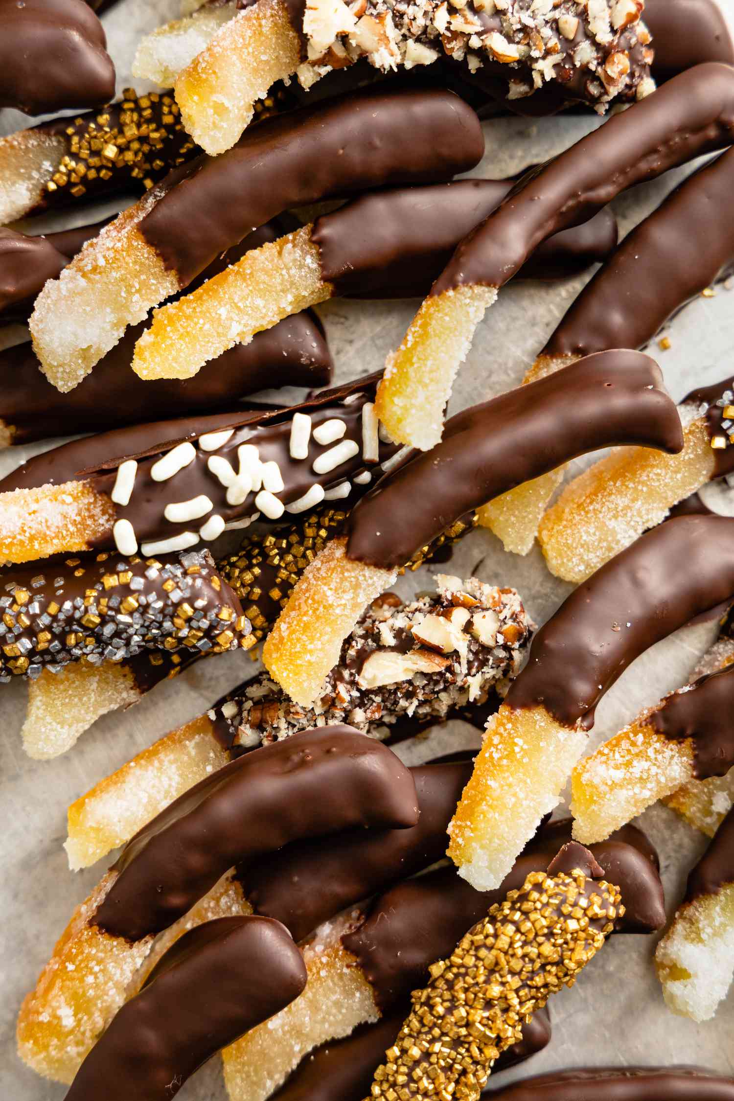 Close Up: Chocolate Covered Orange Peels with Some Topped with Sprinkles