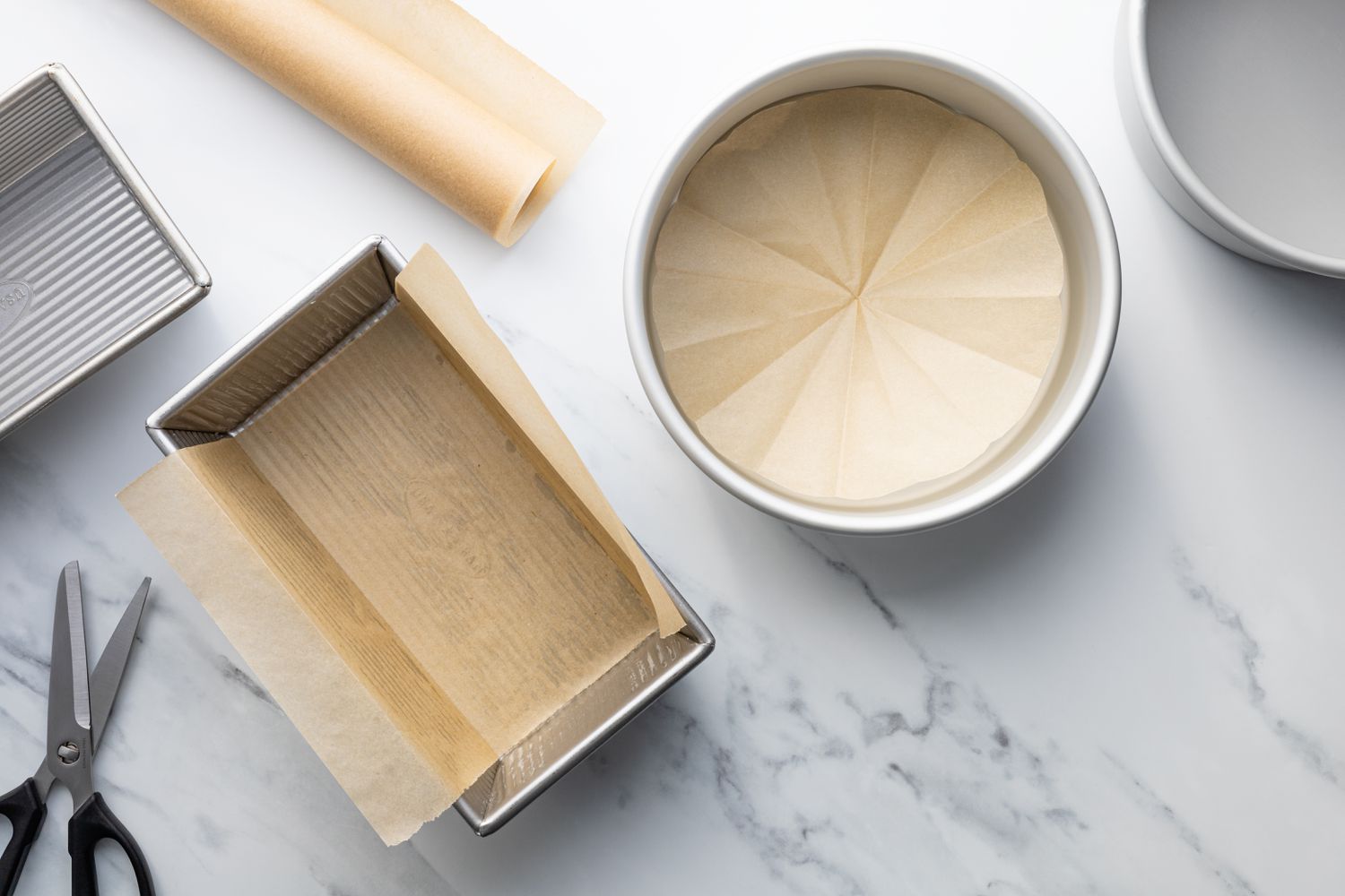 Cake pans lined with parchment paper