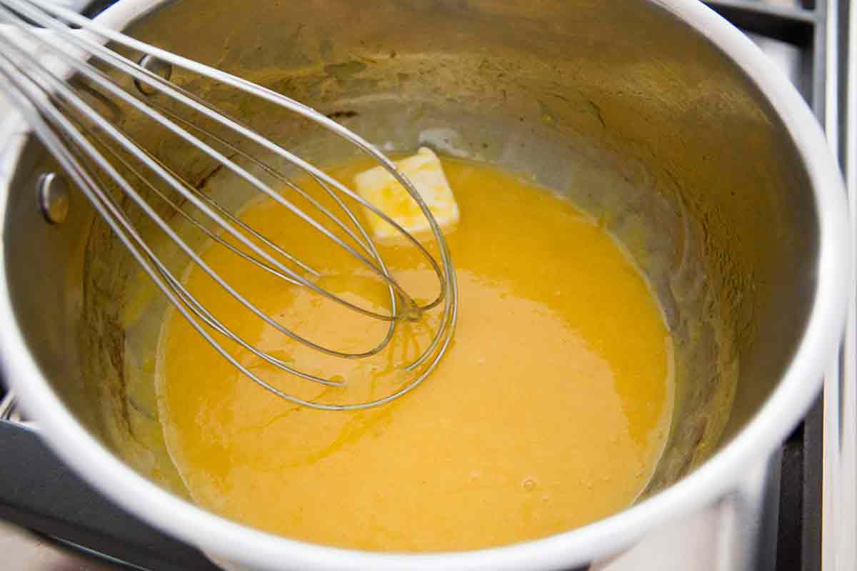 add cold butter a tablespoon at a time for orange beurre blanc sauce