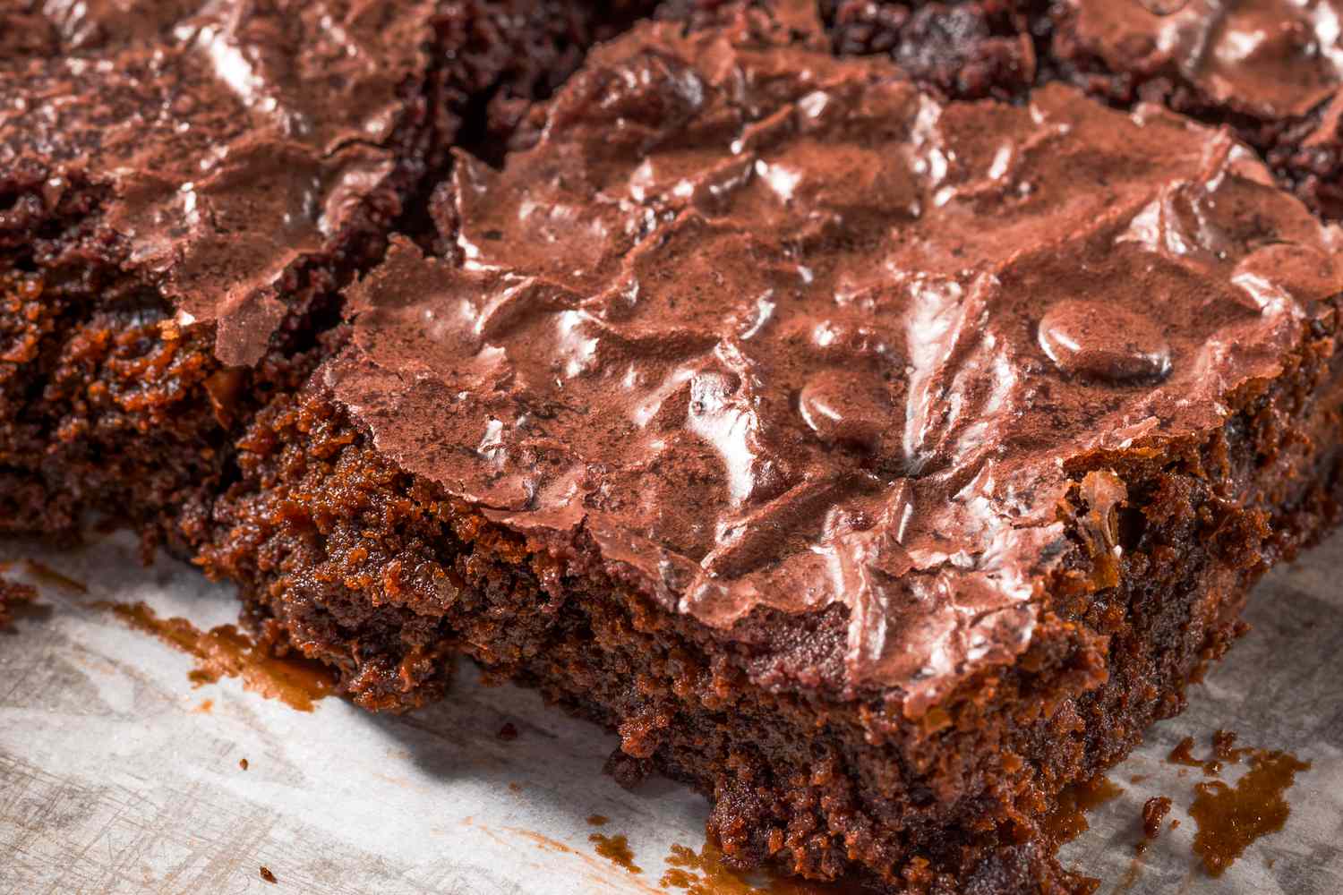brownie on a piece of parchment paper