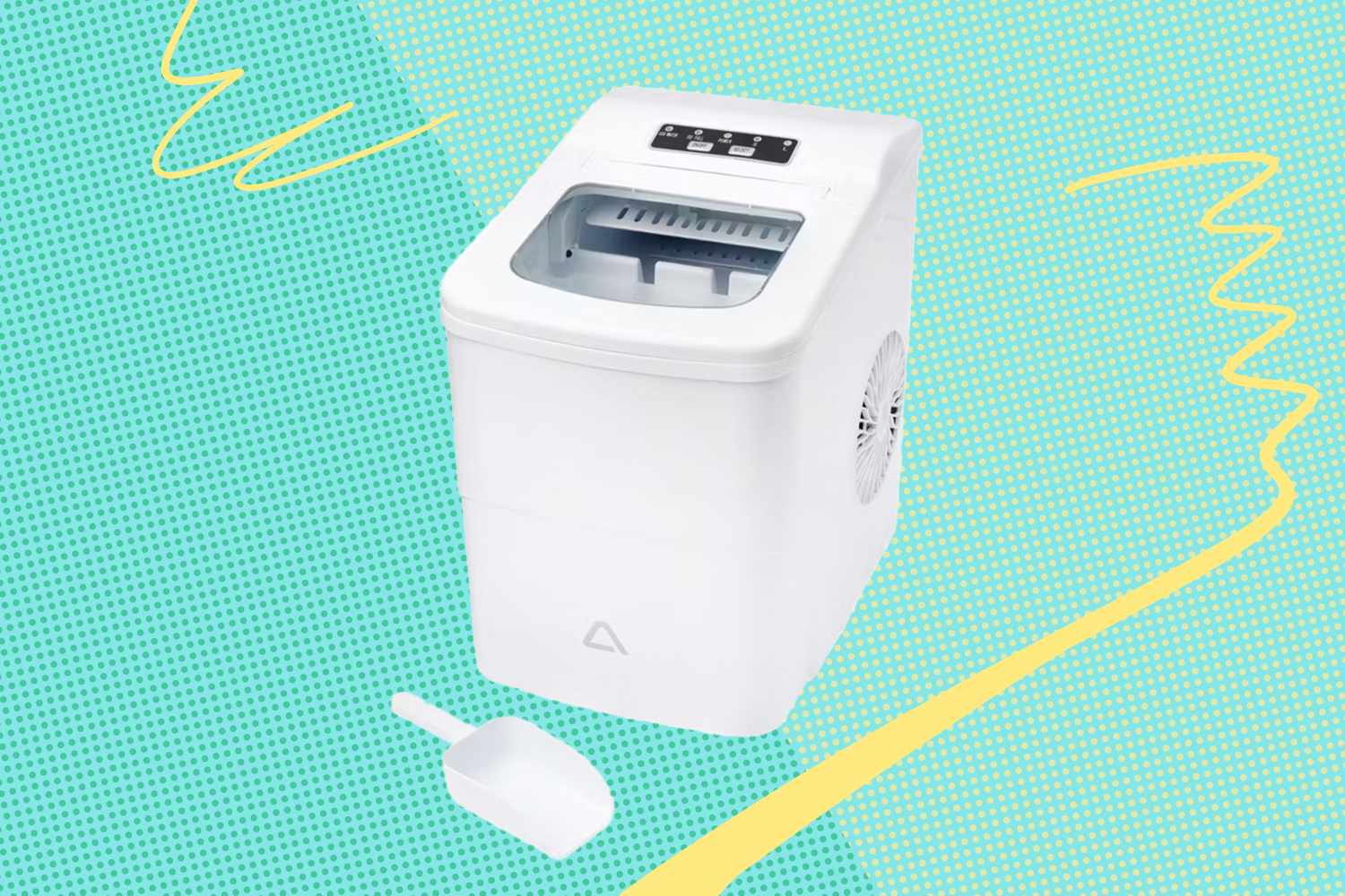 Compact countertop ice maker with a scoop on a patterned background