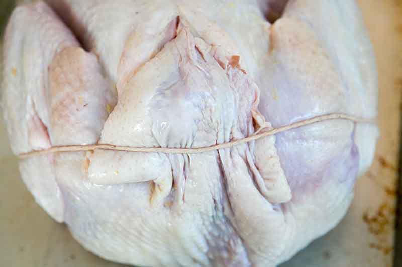 The neck cavity wrapped for a turkey recipe.