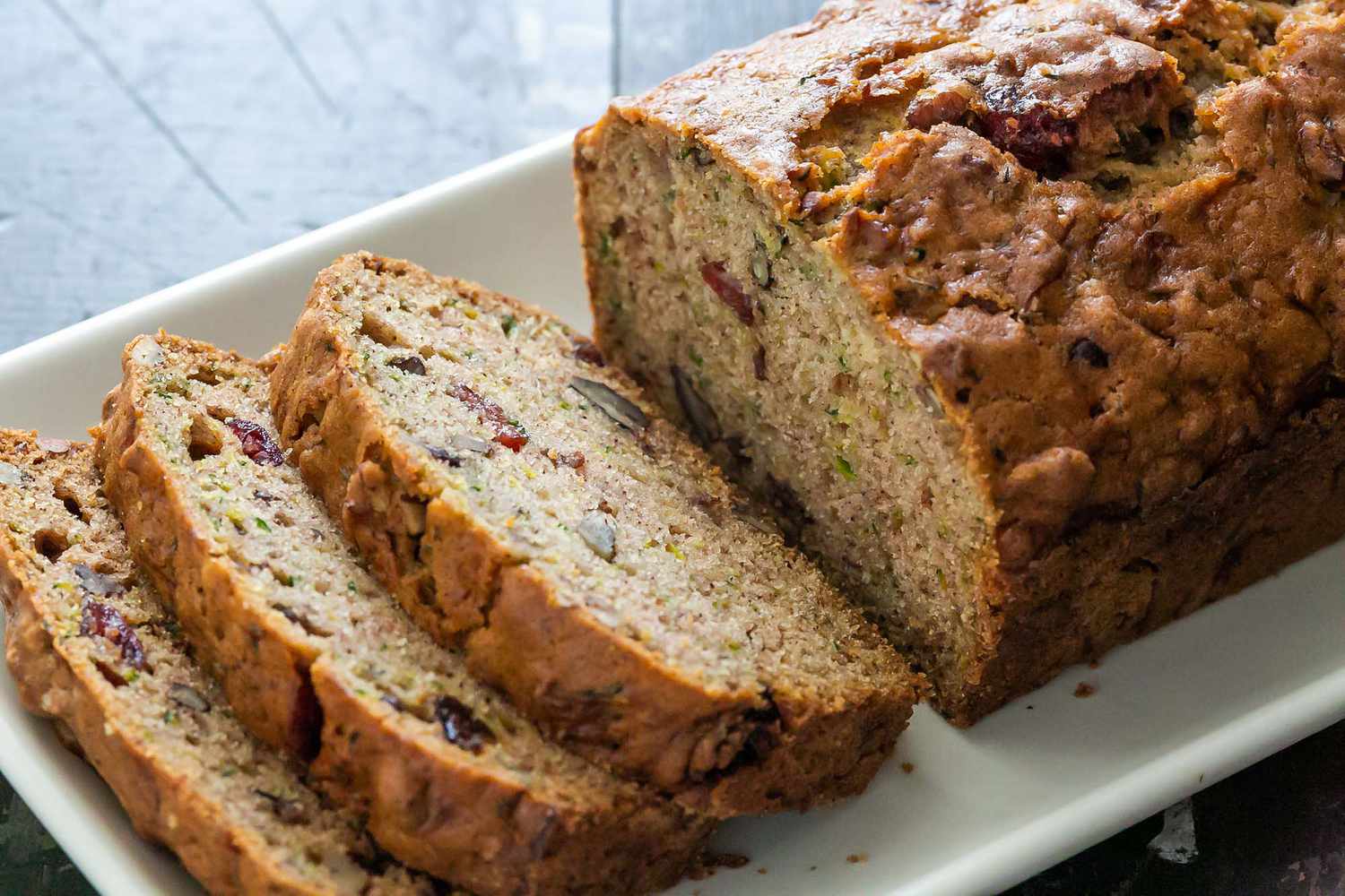 Slices of easy zucchini bread on a platter