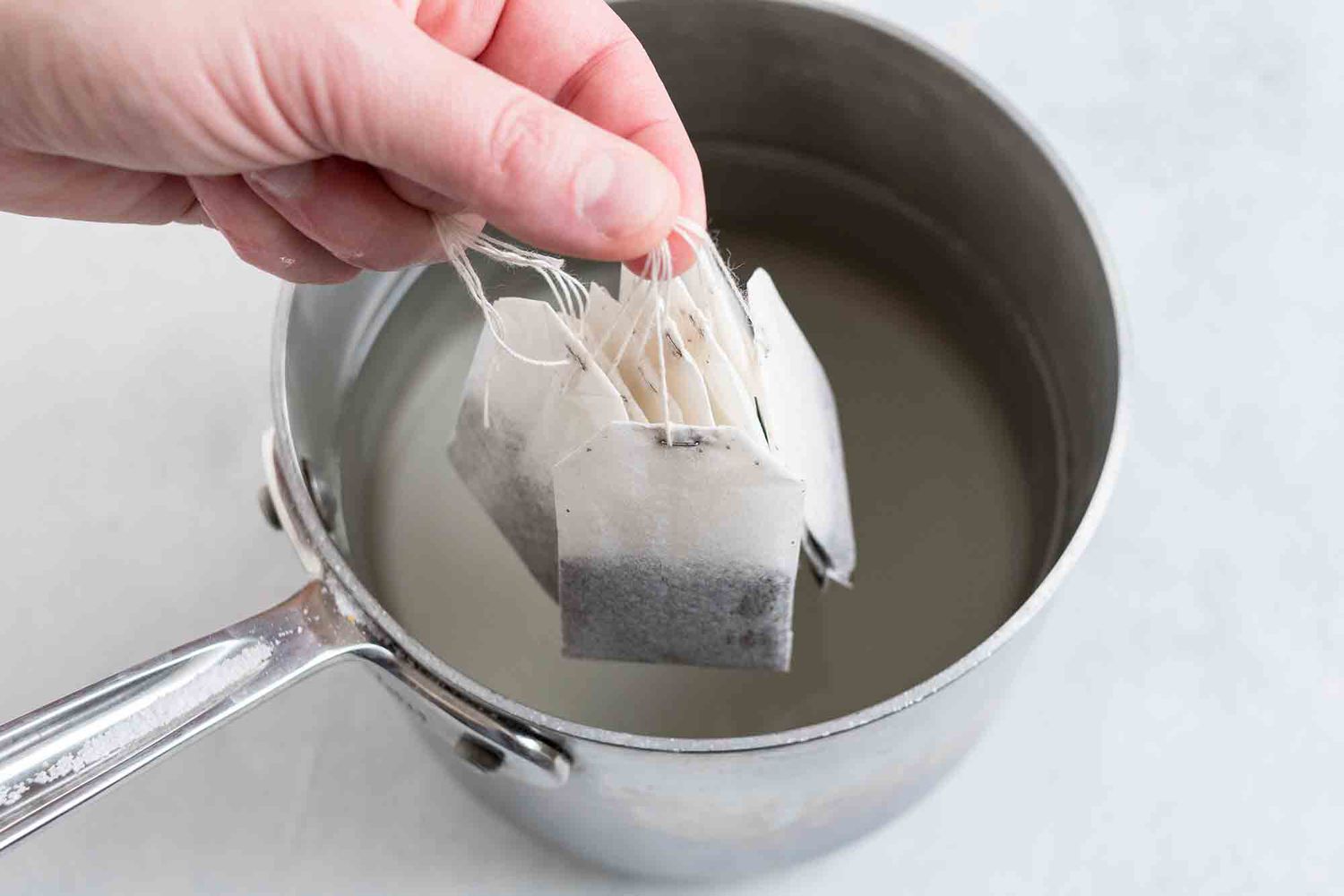 Next, add the tea for making kombucha into the sugar water n a medium saucepan