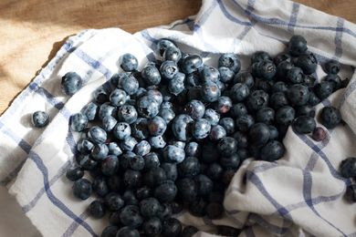 blueberries on a kitchen towel