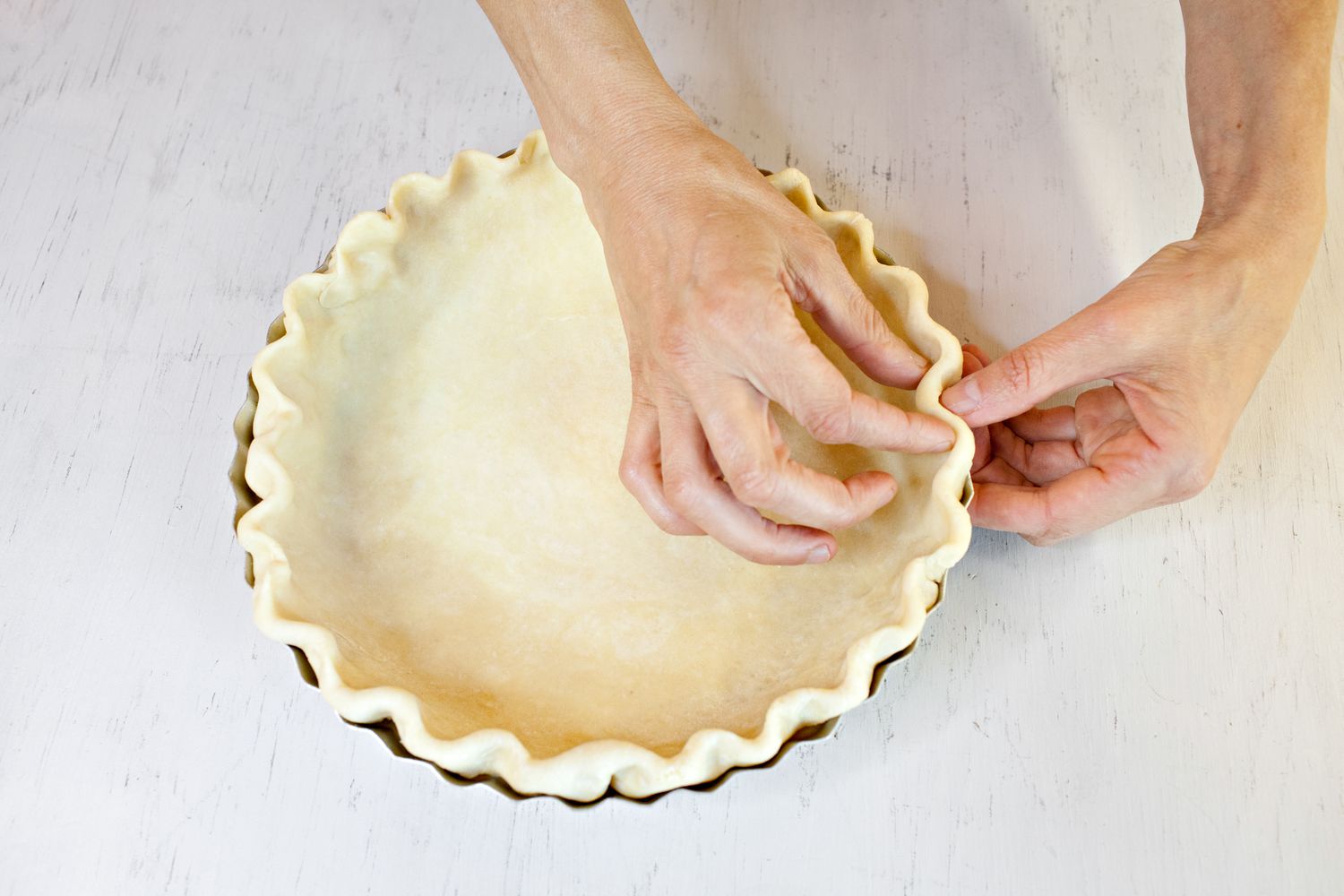 Pie Dough Crust Shaped into a Fluted Edge