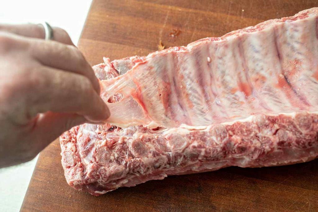 Remove the thin white membrane on the ribs for Instant Pot Baby Back Ribs