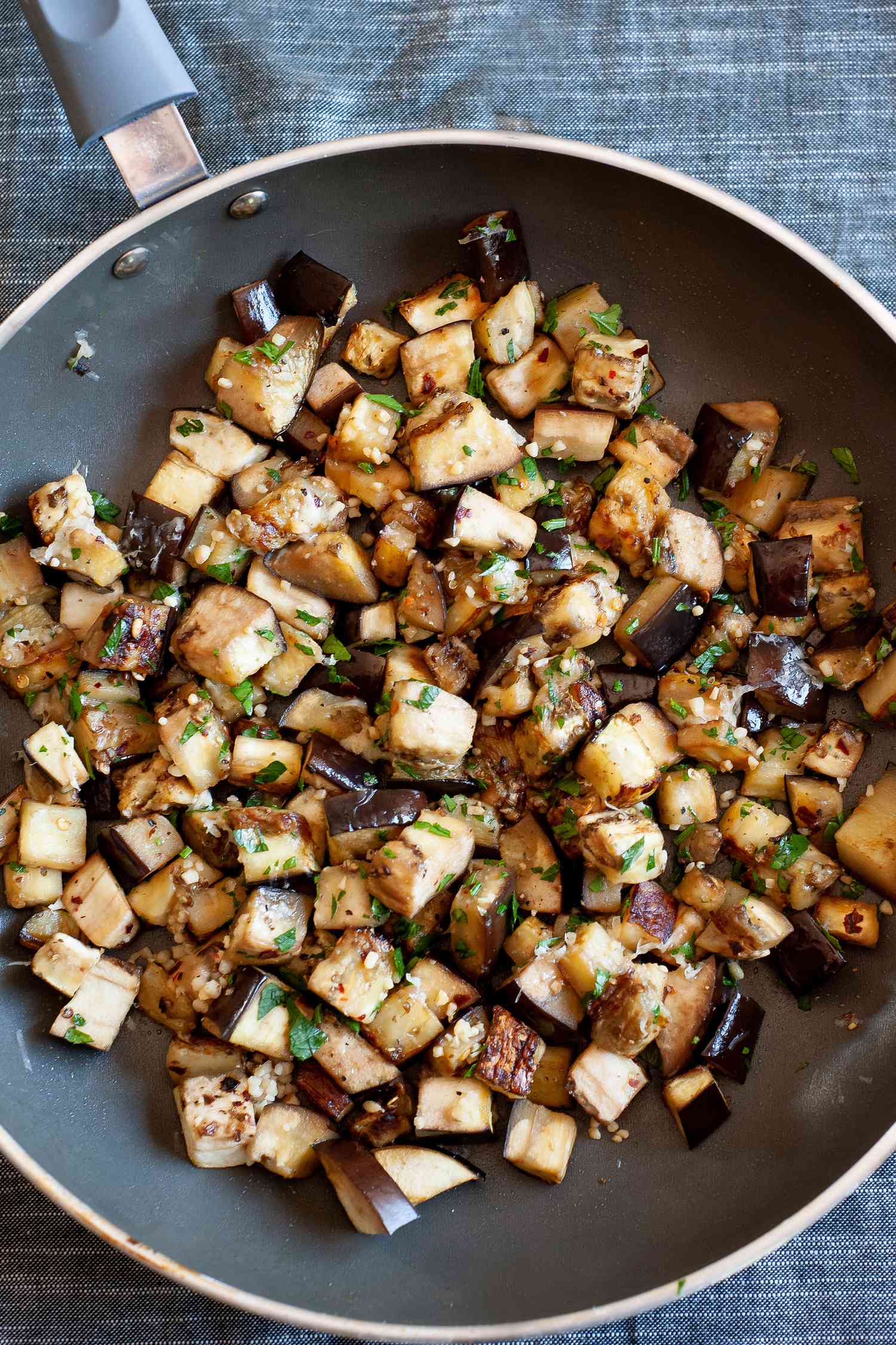 Sautéed Eggplant with Garlic and Parmesan in a Skillet