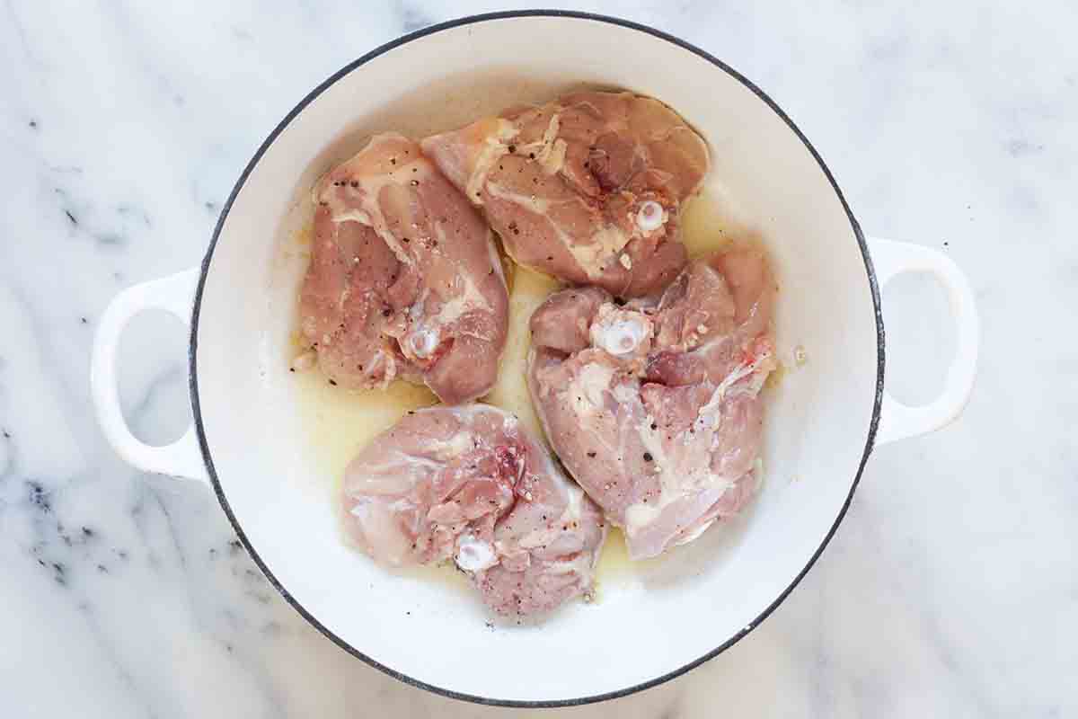 Chicken stew with chicken thighs season the chicken