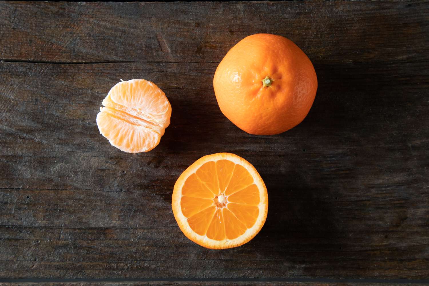 Tangerines on dark background
