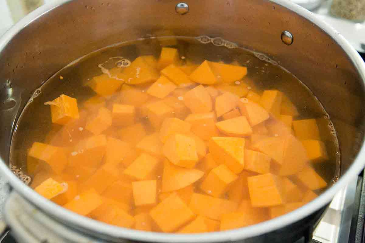sweet potatoes in a pot of water