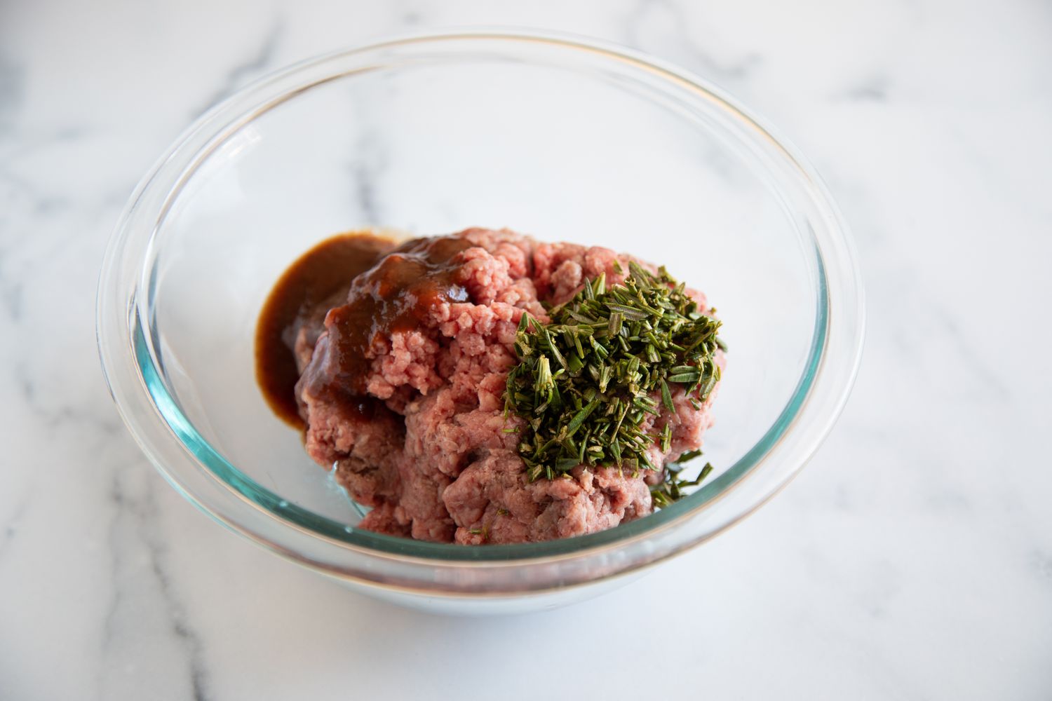 Ground beef and ingredients to make an A1 burger.