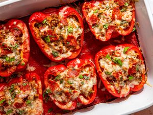 pizza stuffed peppers in a casserole dish
