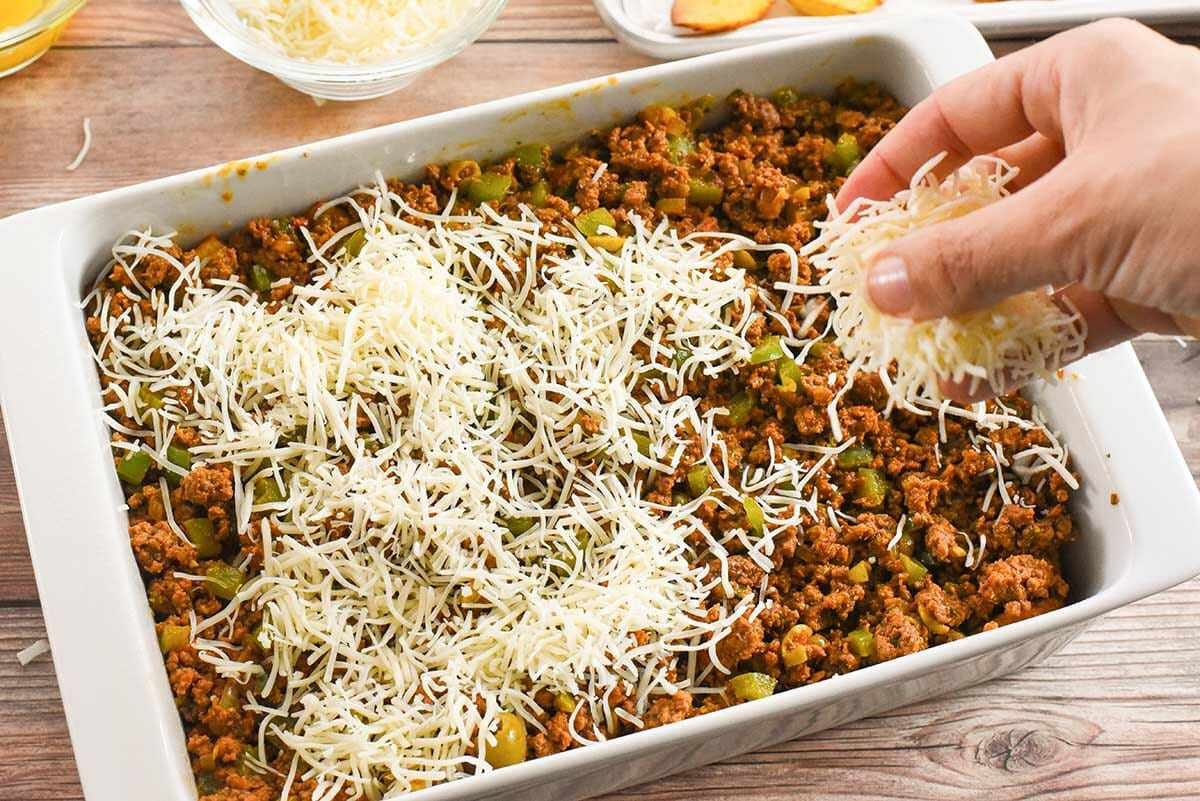 Puerto Rican Lasagna layer the cheese