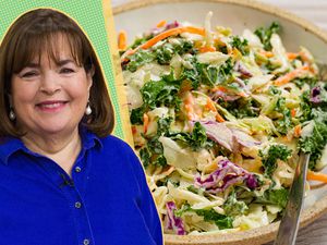 Ina Garten with a bowl of coleslaw featuring various vegetables