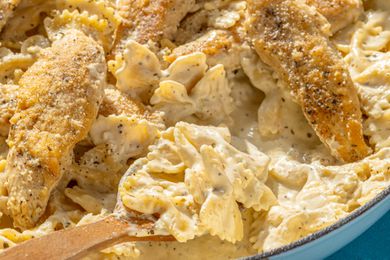 Close-up: chicken caesar pasta in a pan