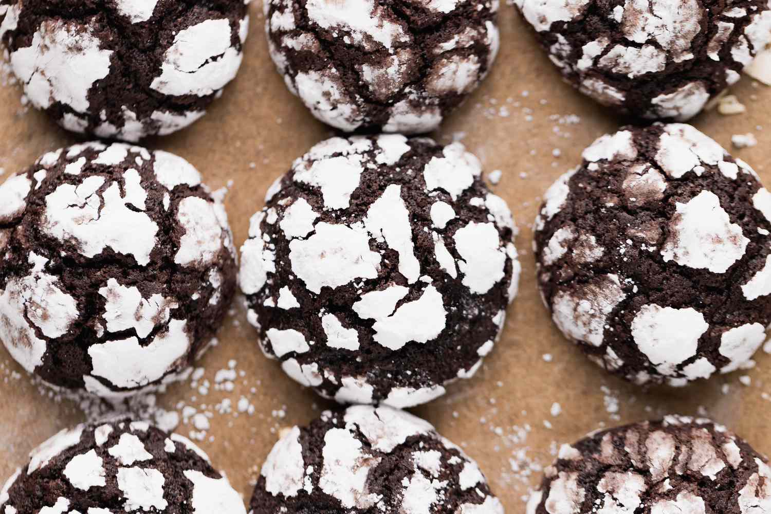 Overhead view of a baking sheet with crinkles on it.
