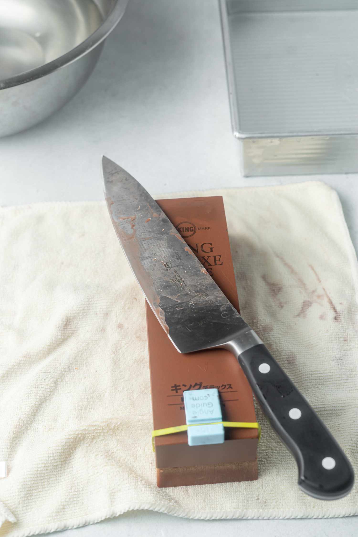 Sharpening a knife on a sharpening stone