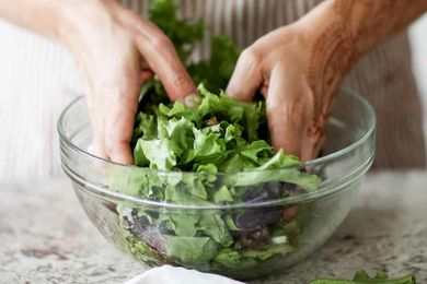 Side salad recipe with peaches, goat cheese, and pistachios toss together the salad and dressing