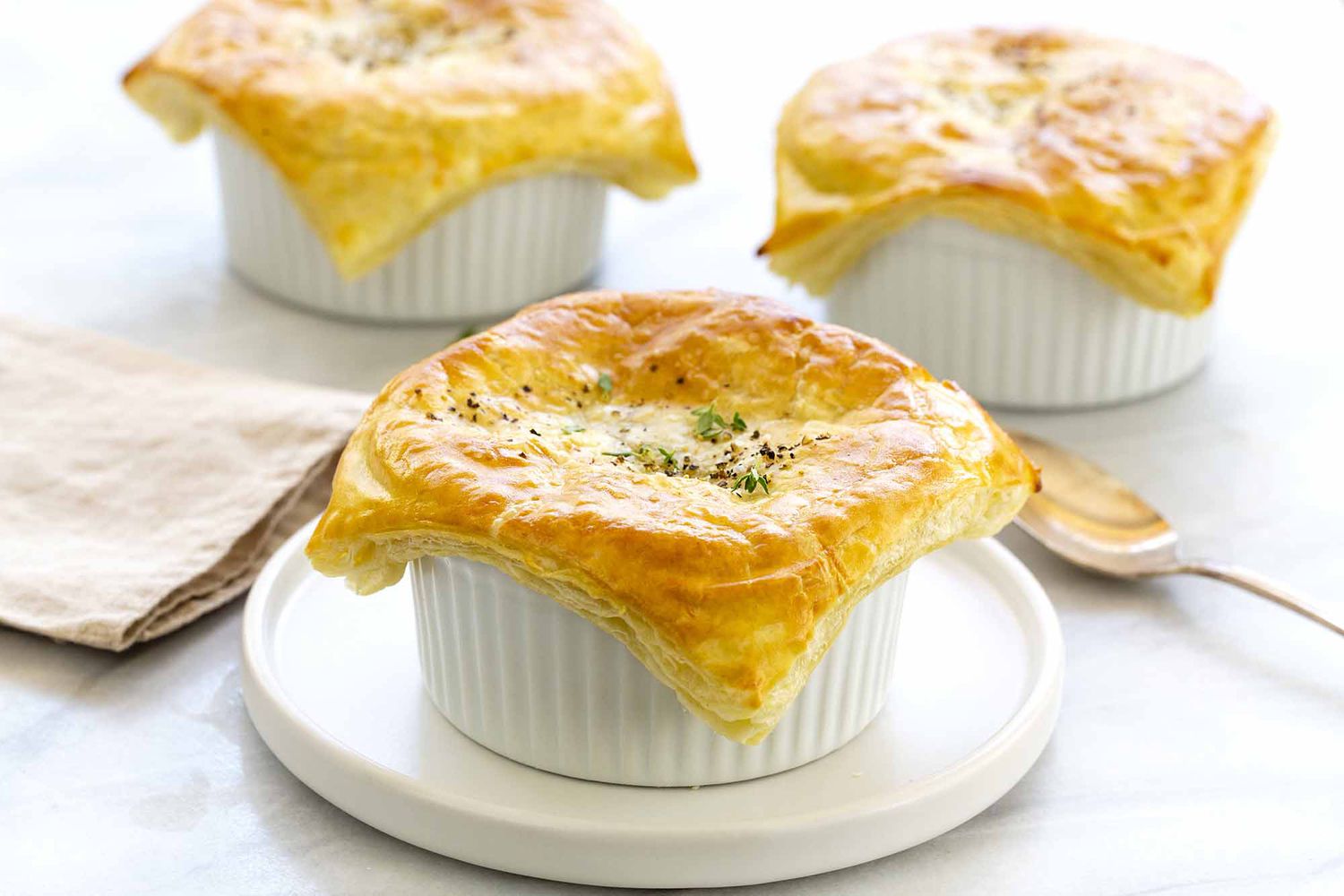 Vegetarian pot pie on white plate.
