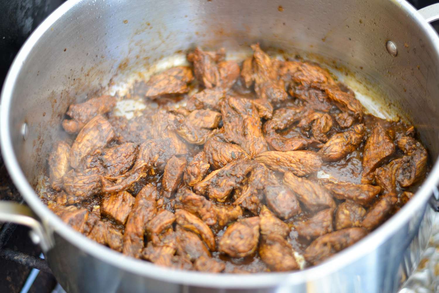Chicken Cooking in a Pot for Rasta Pasta with Jerk Chicken Recipe