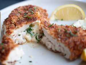Butter oozing out of Chicken Kiev. 