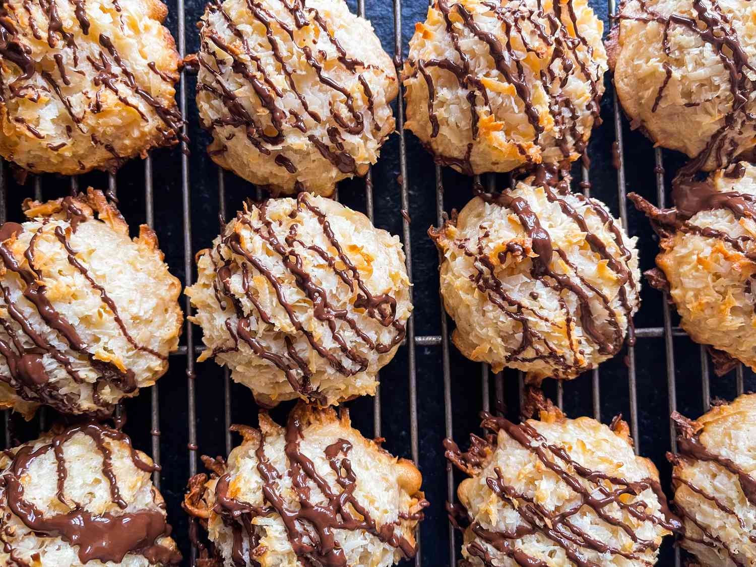 Chocolate macaroons on a cooling racks
