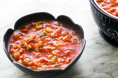 Gazpacho soup in a dark bowl