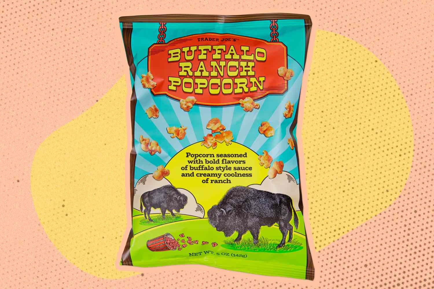 A bag of Trader Joe's Buffalo Ranch Popcorn displayed on a yellow and pink background