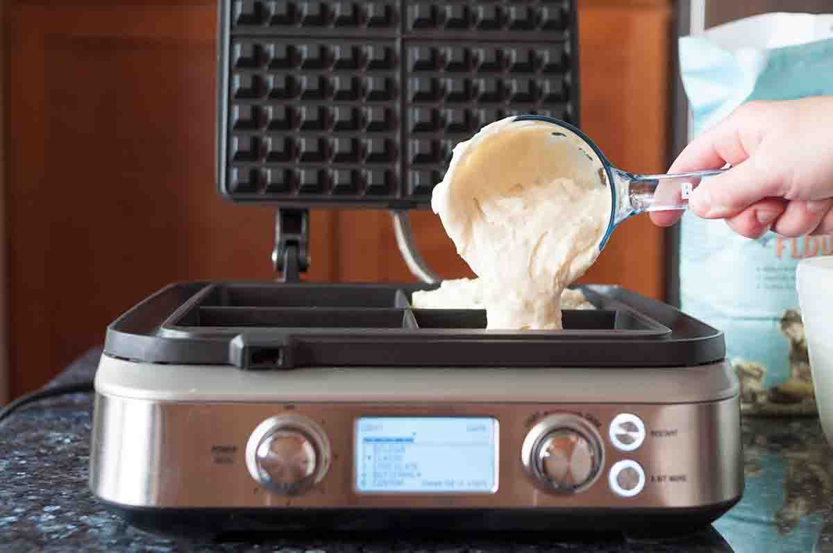 Pour 1/3 to 1/2 cup of waffle batter into each of the wells on he waffle iron