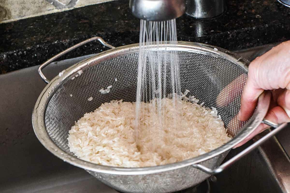 Puerto Rican Rice with Bacon rinse the rice