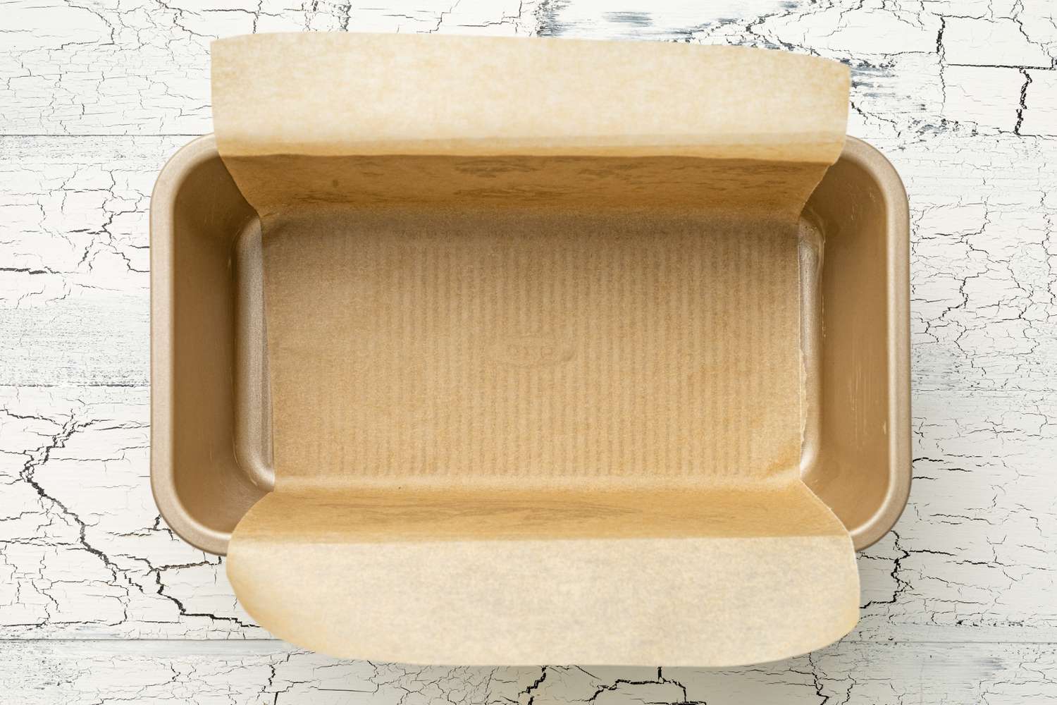 Parchment Paper Lined Loaf Pan for Dark and Stormy Banana Bread Recipe 