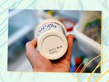 bottom of a tub of sour cream shows expiration date