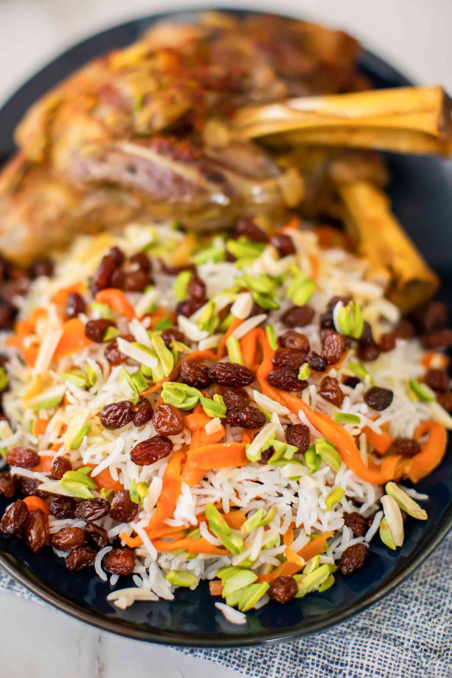 Kabuli Palao (Afghan Lamb Shanks with Rice, Carrots, and Raisins)