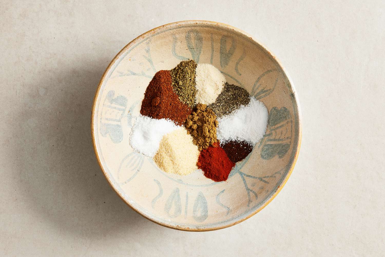 Bowl of Fajita Seasoning Ingredients in Separate Piles 