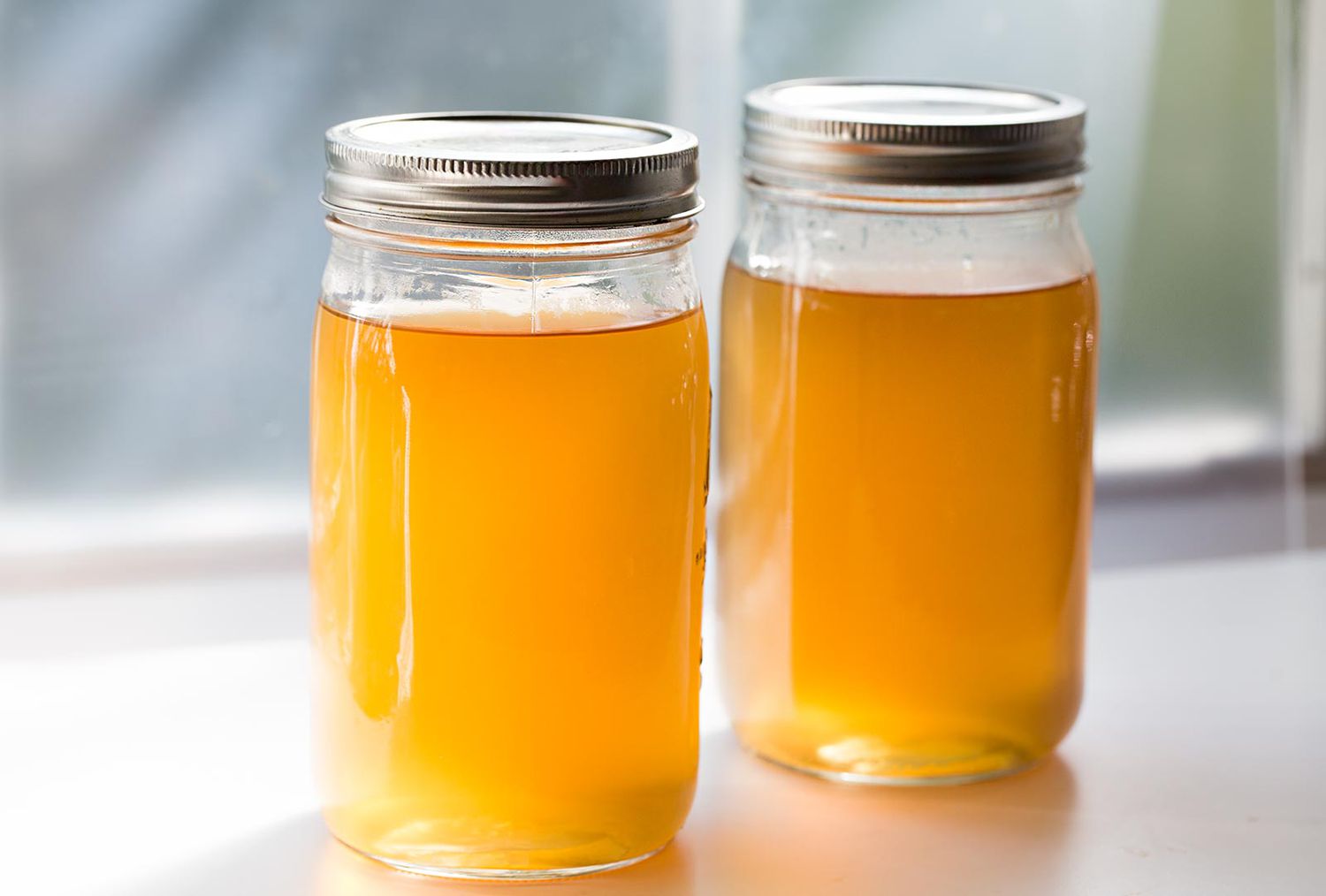 Two jars of shellfish stock.
