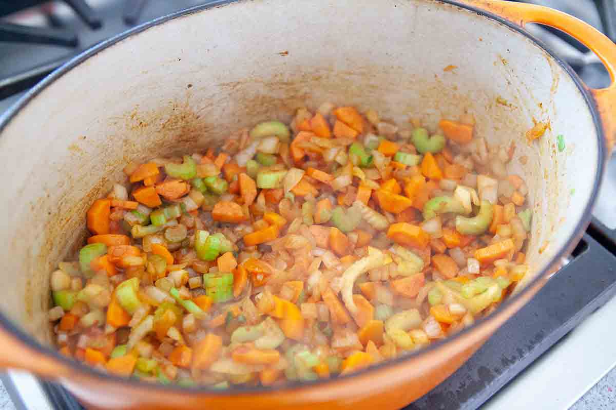 cook vegetables in pot for braised beef roast