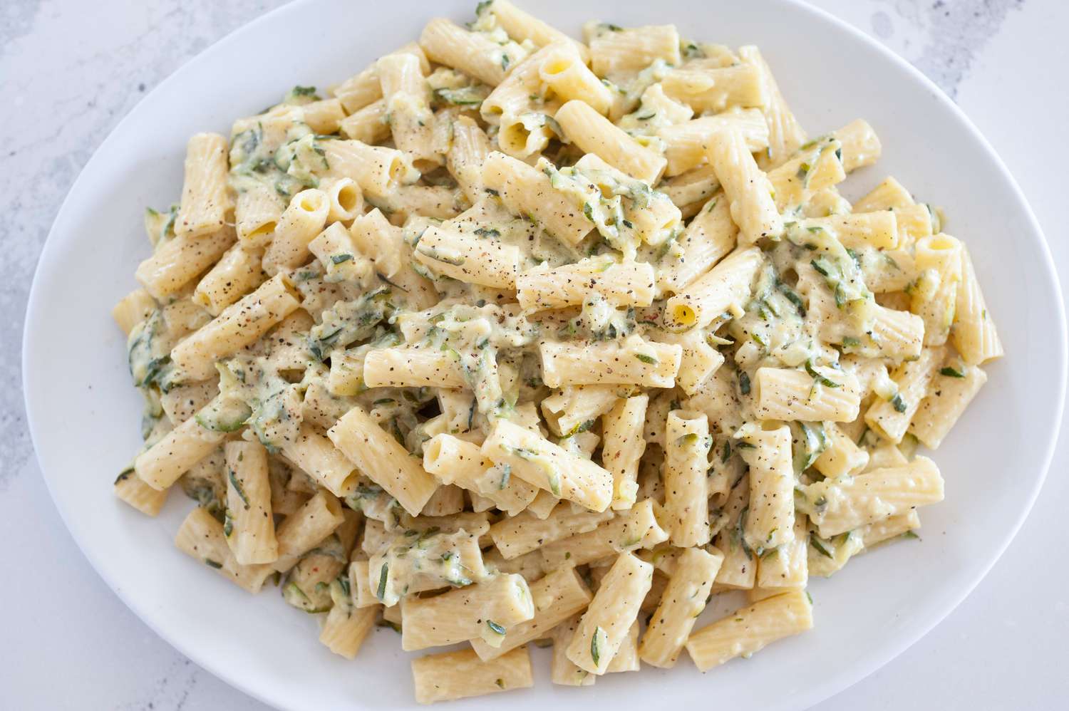 Creamy One Pot Pasta with Zucchini on a Serving Plate