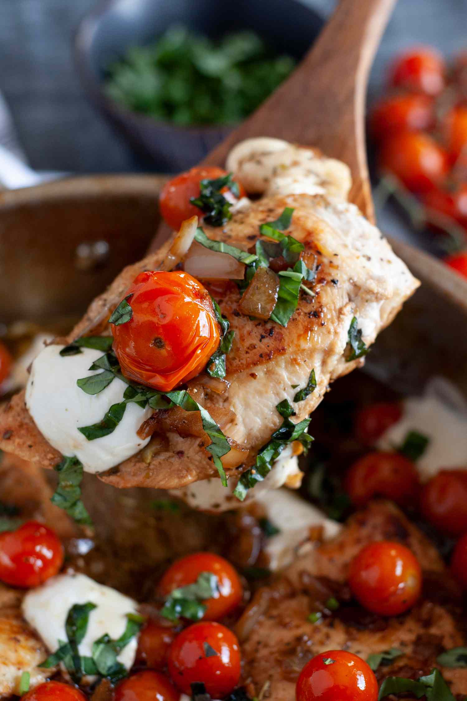Scoop of chicken, mozzarella and cherry tomato.