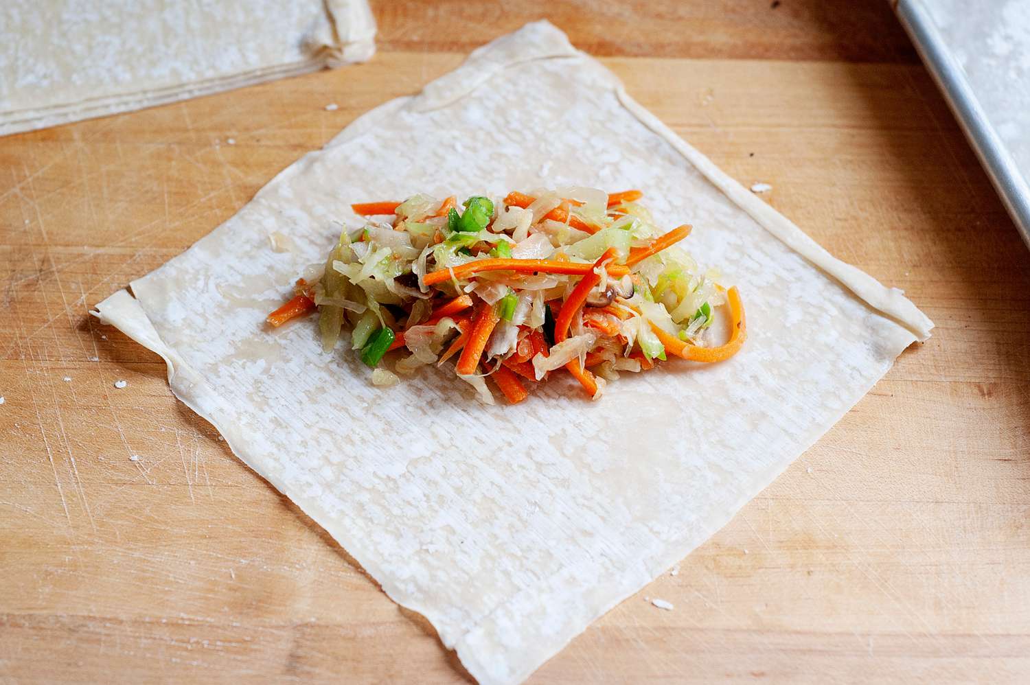 Filling and wrappers for deep fried egg rolls.