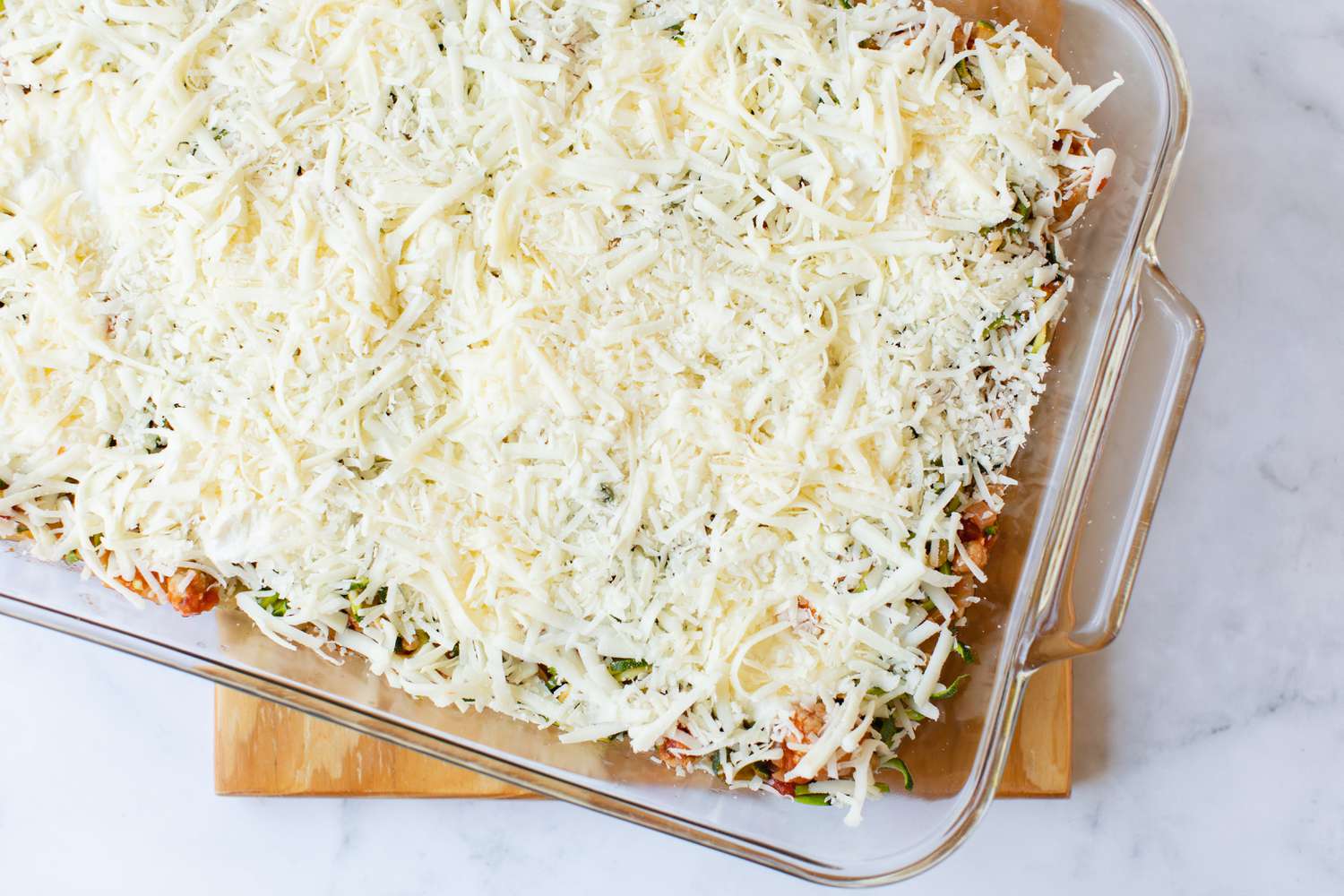 Zucchini Noodle Casserole Topped with Cheese